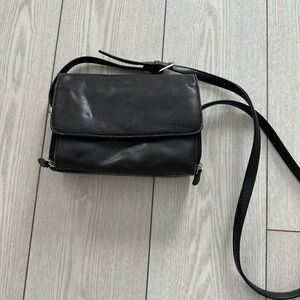 Black Leather Crossbody Shoulder Bag with multiple spaces for coins, receipts et